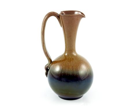 Christopher Dresser for Linthorpe, an Art Pottery jug, model 826, circa 1880, spherical gourd form with conical neck and stra