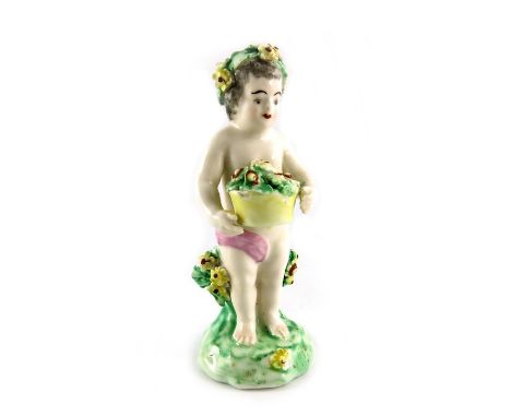 A Derby porcelain figure of a putto with basket of flowers, circa 1770, patch marks, 13cm high