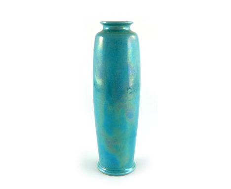 A Ruskin lustre rolling pin vase, 1926, elongated slender shouldered barrel form, turquoise glaze, impressed marks, 27cm high