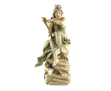 Royal Dux, a Continental figure of Lorelei (Loreley), modelled with harp on a rocky outcrop, impressed marks, 255, 32cm high