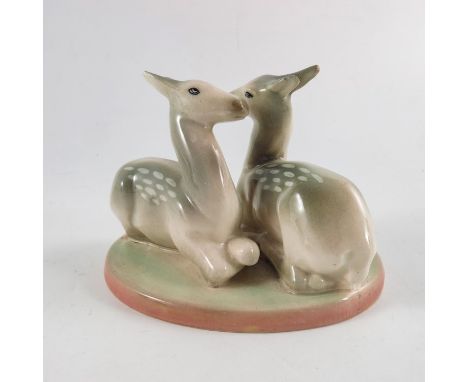 A Myottt Goldscheider figure of two deer, modelled sitting, incised and printed marks, 16cm long