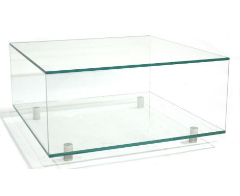 A contemporary Glassdomain glass coffee table, open cuboid form with low shelf, on four adjustable brushed aluminium cylindri