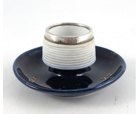 A Victorian silver mounted ceramic match striker, Schindler and Co., London 1900, pedestal sconce form with blue glazed sacer