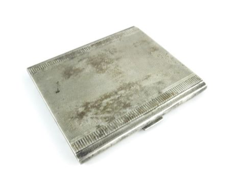 A George VI silver cigarette case, William Neale and Son, Birmingham 1946, rectangular form, engine turned and reeded, 9.5cm 