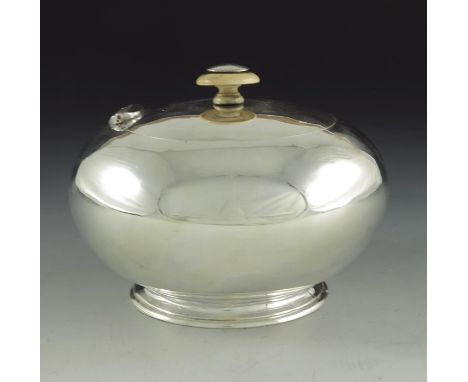 An Imperial Russian silver tea caddy, Andrei Vilbgelmovich Bekman, Moscow 1872, footed squat ovoid form, the hinged lid with 
