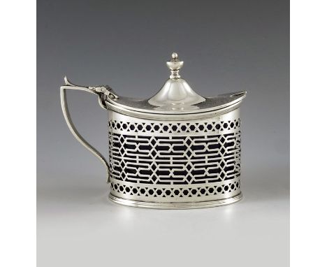 Haseler Brothers, Chester 1906, an Edwardian silver mustard pot, straight sided oval form, reticulated geometric lozenge and 