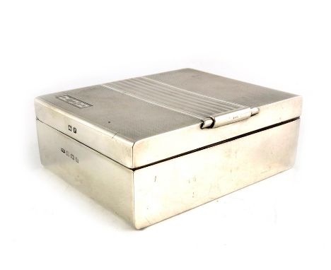 A George VI silver cigar box, Mappin and Webb, Birmingham 1939, Art Deco style, rounded cuboid form, engine turned stripe and