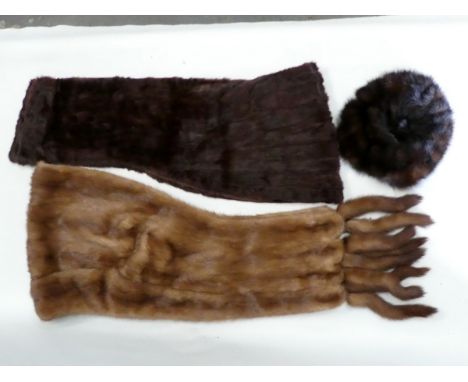 A ladies mink stole - light brown with broad collar and reminating in tassels, together with another stole and a mink hat. (3