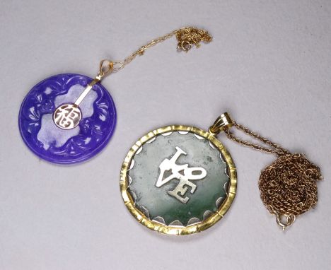 A Chinese purple jade 9ct gold pendant - carved with bats and with Chinese characters to the centre, diameter 3.5cm, together