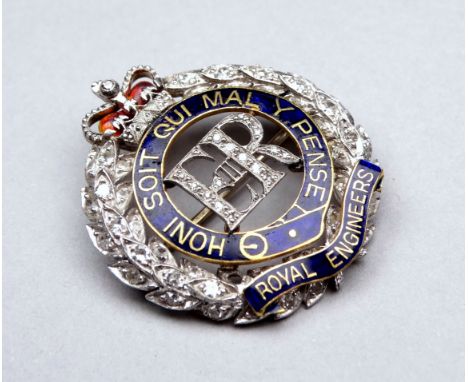 A diamond set sweetheart brooch - Royal Engineers, in the form of a wreath incorporating a blue enamel garter, weight 6.8g.