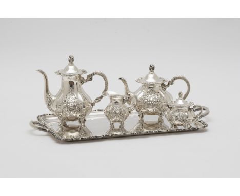 Ensemble comprenant une théière, une cafetière, un sucrier, un pot à lait et un plateau à deux anses en argent 925°/°° sterli