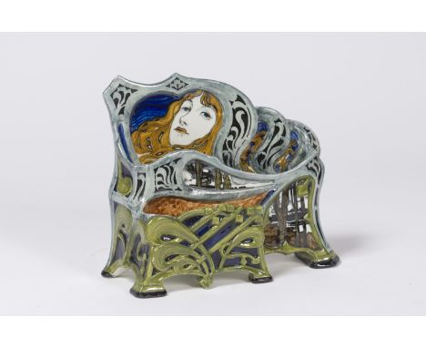 Trieur à courrier en céramique vernissée, circa 1900A décor peint d'un visage de femme, d'éléments végétaux et d'un paysage.S