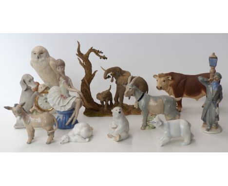 A group of eleven porcelain and resin figures including Nao, a Franklin Mint figural owl clock, Lladro style figures etc