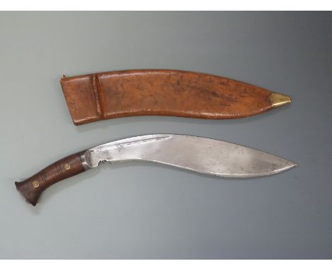 WWII Kukri marked to blade M G 43 and to scabbard 46 and G.W.L Co 1944, blade length 34cm