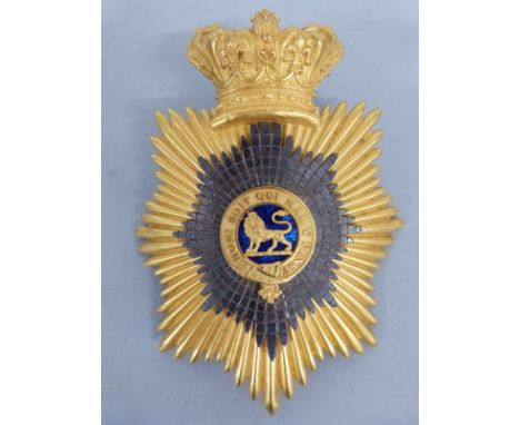 An 1829 pattern officer's gilt metal shako plate for the 29th Regiment of Foot (Worcester Regt.), the centre of blue guilloch