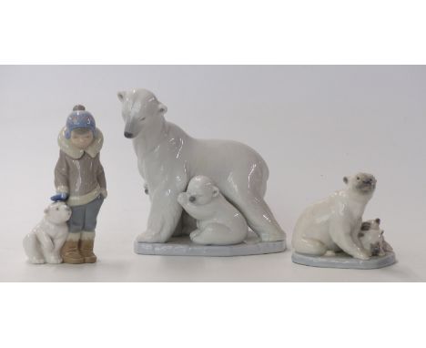 Two Lladro figures of polar bears with cubs and a Lladro Eskimo / Inuit child with polar bear cub