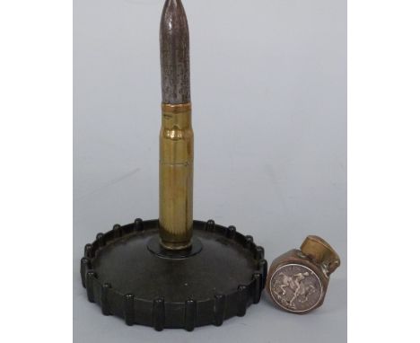 A trench art lighter made from a 1914-18 Medal and Victory Medal named to A Hayden GSR, M.F.A together with a trench art ligh