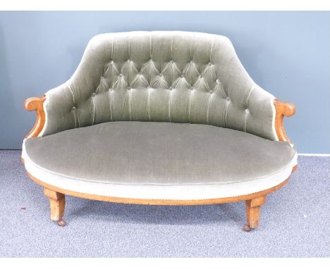 A mahogany framed upholstered button back salon sofa, W126 x H77 x D65cm