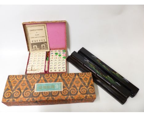 A bone and bamboo Mahjong set with painted lacquer stands 