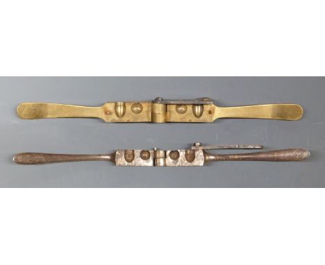 Two revolver bullet mould tools one brass stamped P 587 the other steel stamped 3072. 