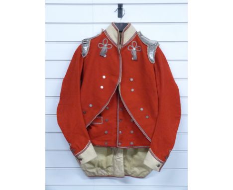 British Army Yeomanry Cavalry coatee and vest, c1794-1801, the jacket in red cloth with blue facings and turnbacks, edged in 