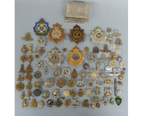 A quantity of WWI, WWII and other badges with Nazi German Finnish Cross, Exeter & South Devon 1st Volunteer Rifles 1852 ename