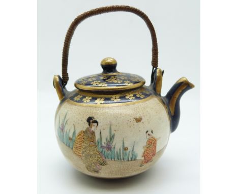 Japanese Satsuma miniature teapot with figural decoration and seal mark to base, 5.5cm tall