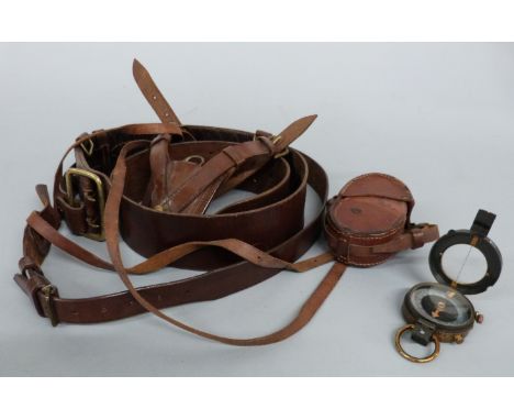 A leather Sam Brown style belt and a military marching compass by F Darton & Co, dated 1916