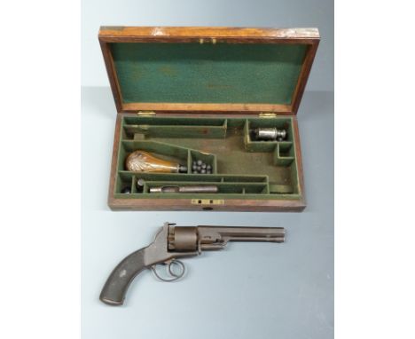 Webley Bentley six-shot double action revolver with chequered grips, scrolling engraving to the frame, hinged storage compart