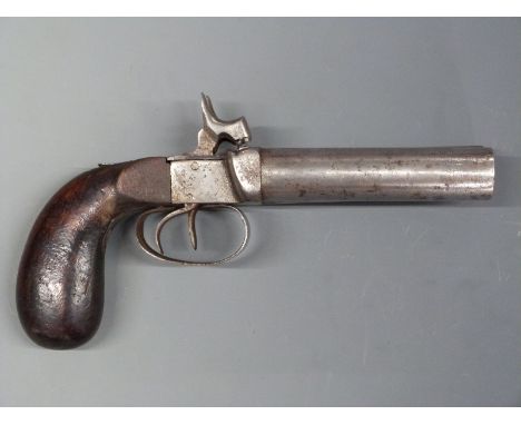 Unnamed 12 bore side by side percussion hammer action 'man stopper' pistol with shaped wooden grips, double trigger and 4 inc
