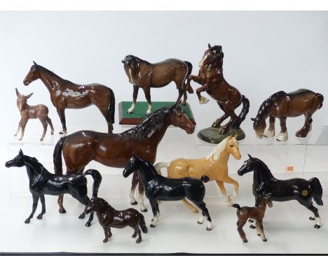 Twelve Beswick / John Beswick figures including horses, foal, donkey and a Hackney