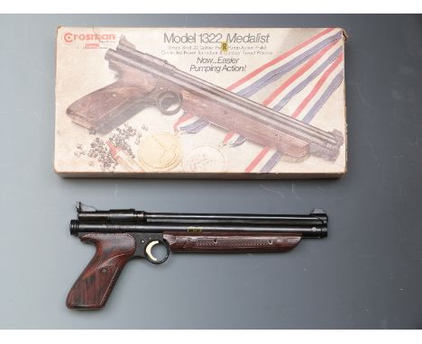Crosman Model 1322 Medalist .22 air pistol in original box with owner's manual, paper targets and related paperwork, serial n