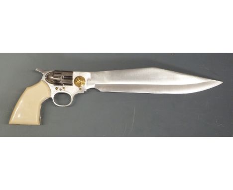 A novelty stainless steel knife in the form of a revolver with faux ivory handle, 30cm long