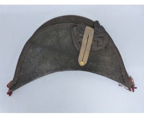 British Army Coldstream Guards bicorn hat, edged in black with wired decoration to the corners, gold tape to the front, roset