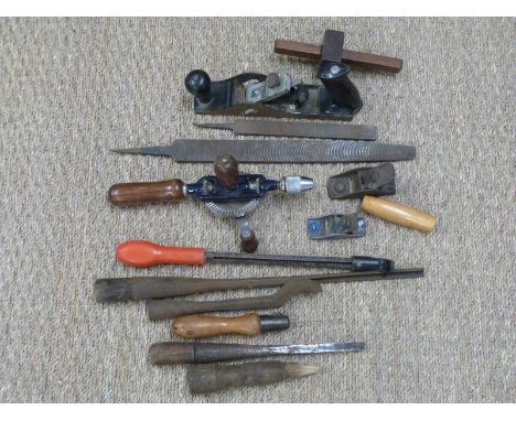 A collection of vintage woodworking tools including a Stanley RB10 plane, miniature planes, John Hall rosewood and brass cutt
