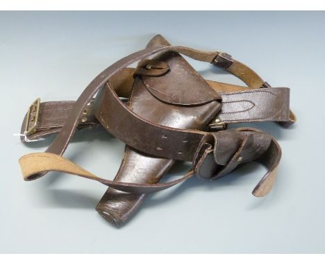 British Army Webley brown leather pistol holster 34cm long and communication pouch both mounted on a belt. 