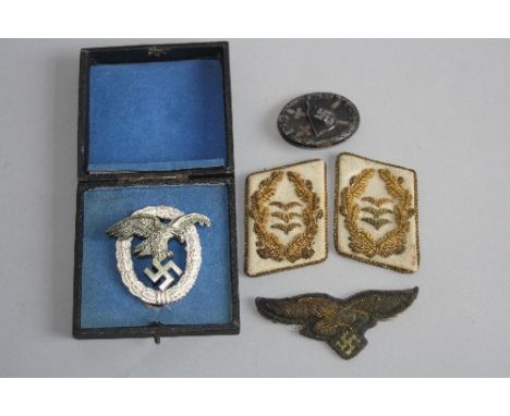 A BOXED AND ORIGINAL WWII NAZI LUFTWAFFE BEOBACHTER WHITE METAL OBSERVERS BADGE, with the riveted Eagle and Swastika and bear