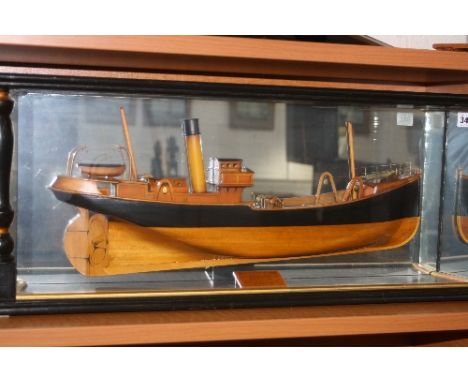 A WOODEN HALF BLOCK MODEL, of 'S.T. SUN IV, built by Eagle, Hull, 1915, 105 x 22.5 x 12.4', in a display case with mirrored b