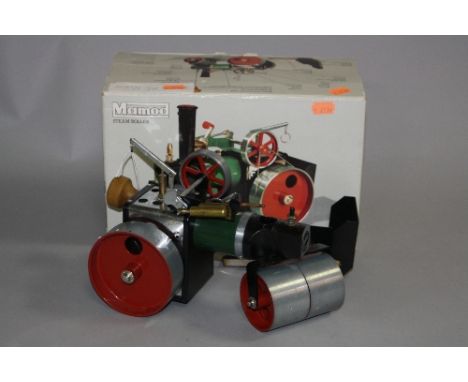 A BOXED MAMOD LIVE STEAM ROLLER, no. SR1A, not tested, missing funnel and drive band, but complete with accessories and fuel,
