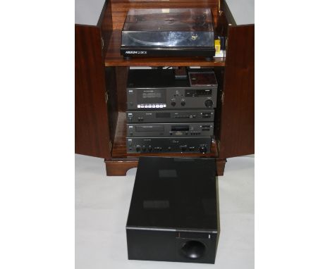 A NAD SEPERATES HI-FI SYSTEM, in a modern mahogany hi-fi cabinet, to include NAD 3130 Stereo Amplifier, a 5240 Compact Disc p