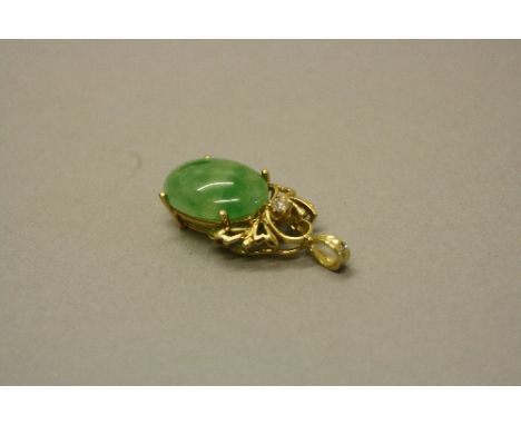 A MODERN JADE AND DIAMOND PENDANT, oval cabochon jade measuring approximately 20mm x 14.8mm, one modern round brilliant cut d