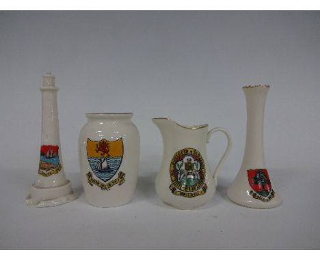 W H GOSS WELSH CRESTEDWARE, comprising Borth Eddystone lighthouse, Rhyl urn, Pwllheli jug, Carnarvon Romano-Salopian ewer, Ll