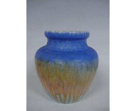 A RUSKIN POTTERY OVOID SHOULDERED VASE, having blue, green and dripping orange crystalline glaze, impressed Ruskin, England 1