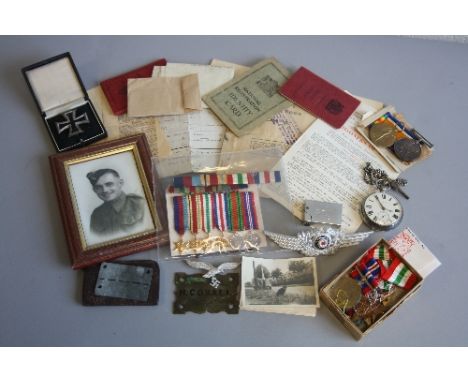 A FAMILY ARCHIVE OF MEDALS AND OTHER RELATED PAPERS AND ITEMS, relating to a father and Sons Service in WW1 and WW2. Firstly 