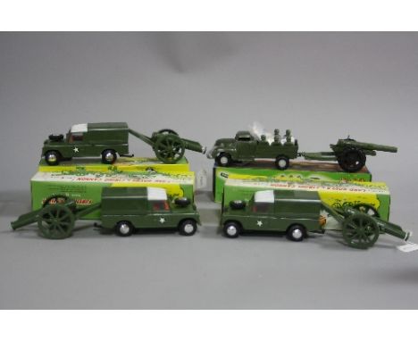 THREE BOXED DELAMARE PLASTIC FRICTION DRIVE LAND-ROVER AND FIRING CANNON TOYS, no. 131, all appear complete except one is mis