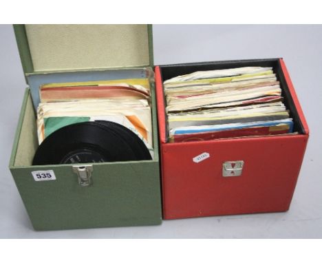 TWO CASES OF SINGLES, including over eighty four Elvis Presley recordings and a few Beatles and Rolling Stones