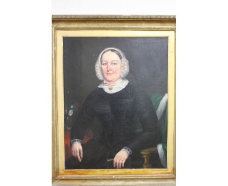 MID 19TH CENTURY BRITISH SCHOOL, half length portrait of a seated lady wearing lace cap and black dress, oil on relined canva