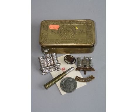 A WW1 CHRISTMAS 1914 PRINCESS MARY TIN, containing 2 Iniskilling Cap devices an Iniskilling Sweetheart brooch, Worcester Coll