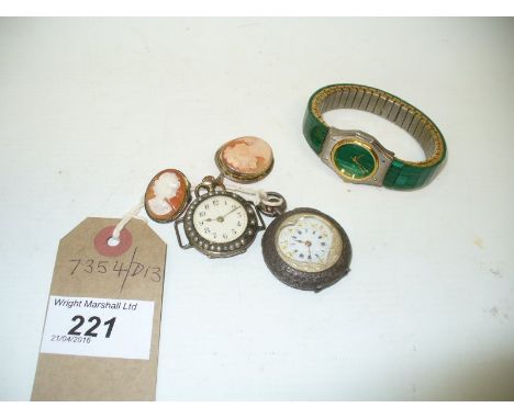 Two Cameo brooches to silver surrounds, a silver pocket watch with a heart shaped face, a continental silver, enamel and seed