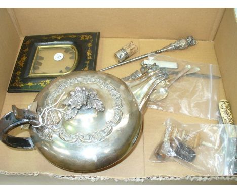 A 19th Century silver plated teapot with a flower head and leaf finial, ebonised picture frame , a button hook with a white m